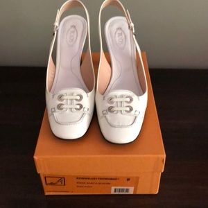 100% Authentic White Patent Tod’s sling-backs.